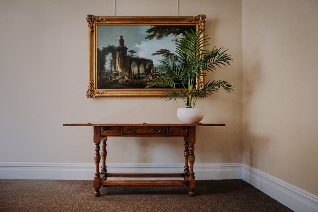 Hall Console Table opening into a dining table, in antiqued oak finish