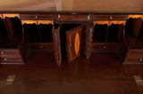 detail of antique mahogany bureau showing fitted interior